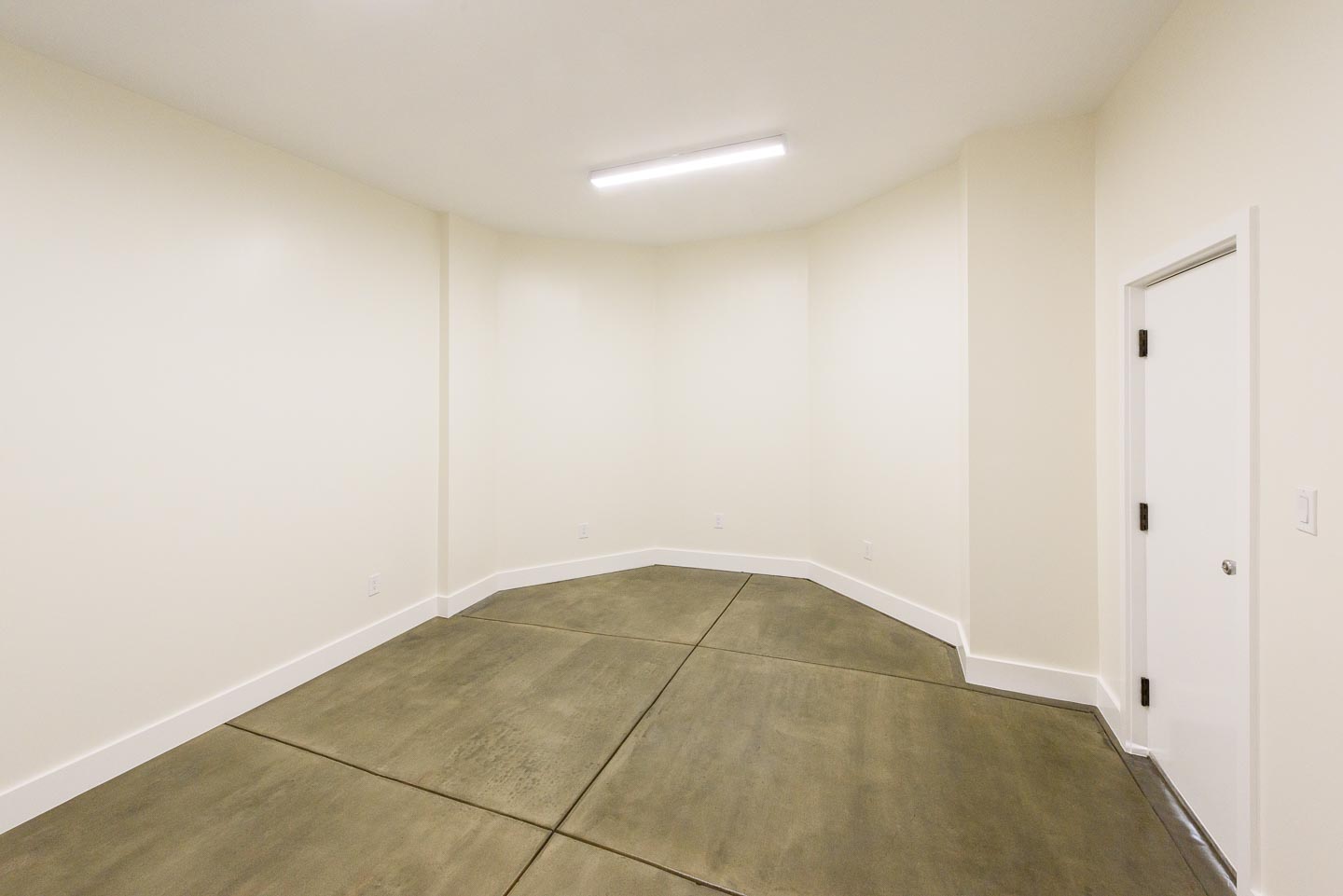  Bonus Room. Additional 200 sq. ft. with separate steel security door • Ethernet networked & electrical outlets • Stained concrete floor 